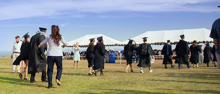 Walking to commencement event on the East Field